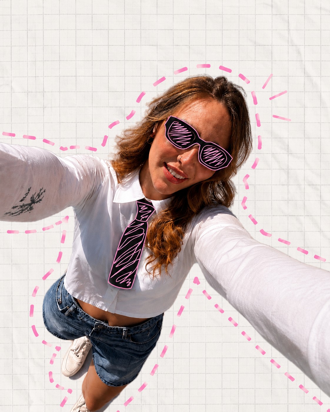 Daniela Arce taking a playful selfie with hand-drawn doodle sunglasses and tie