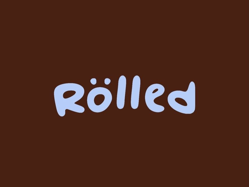 Rölled wordmark alone, set on a chocolate brown background
